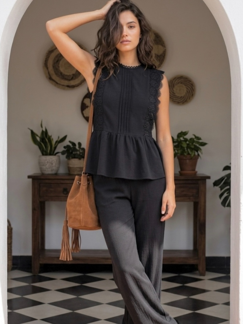 Women’s Black Sleeveless Peplum Blouse